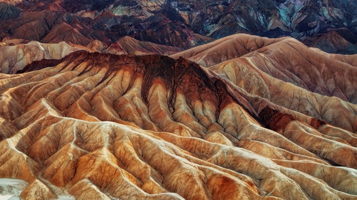 Death Valley badlands with colorful eroded mountains