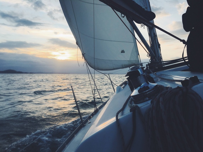 Sailboat on the water at sunset