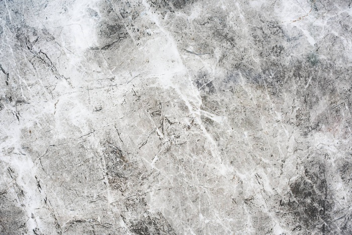 Gray and white marble texture with dark veins