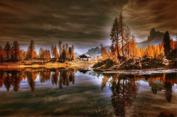 Autumn lake reflection in the Dolomites, Italy