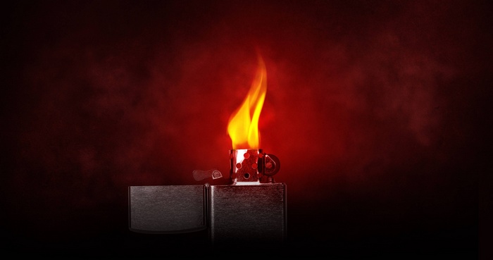 Zippo lighter with flame and smoke