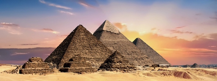 The Pyramids of Giza in Egypt at sunset