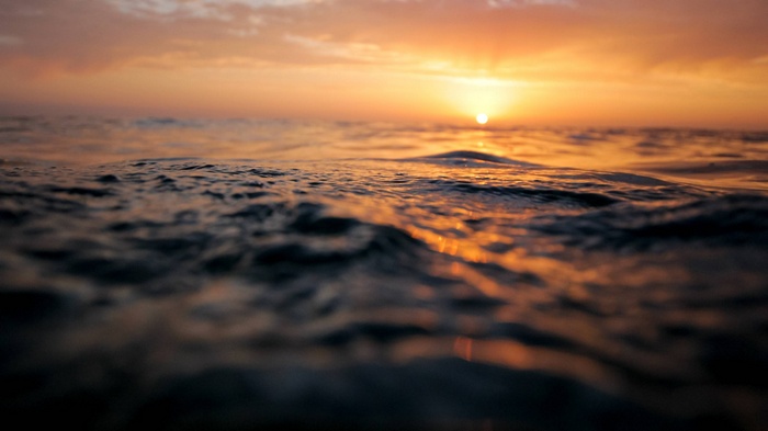Ocean waves at sunset