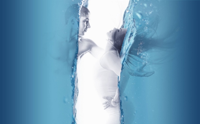 Man and woman in water