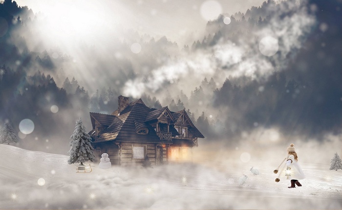 Girl with lantern in a snowy winter forest