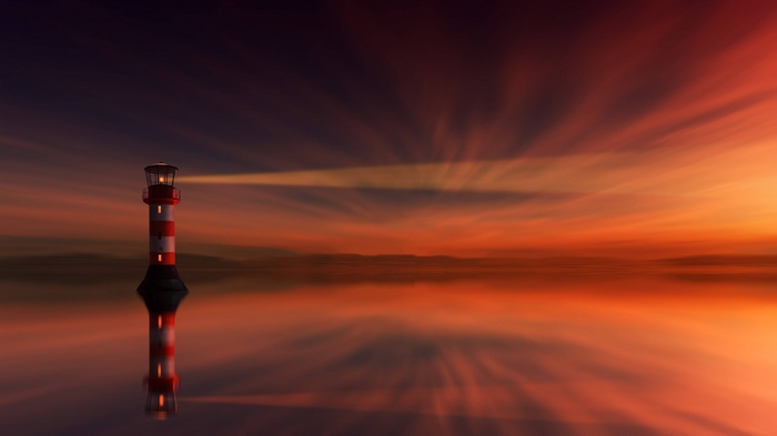 Lighthouse in the sunset over the sea