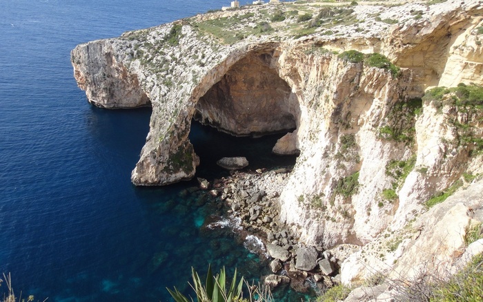 Natural arch over the sea at Dingli Cliffs, Malta