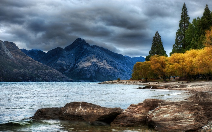 Lake and mountains with autumn trees