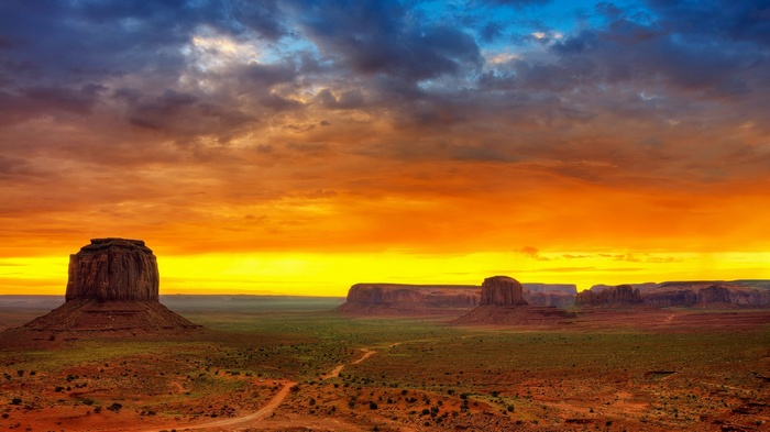 Monument Valley at sunset with dramatic clouds