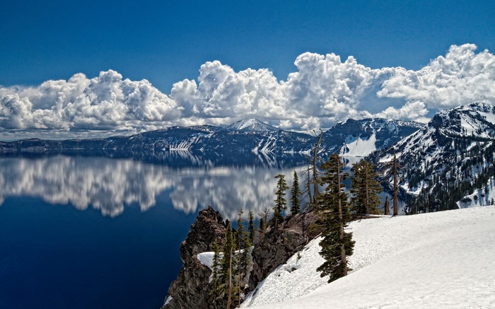 Crater Lake National Park with snow and clouds