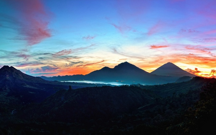 Mountain landscape at sunrise with colorful sky