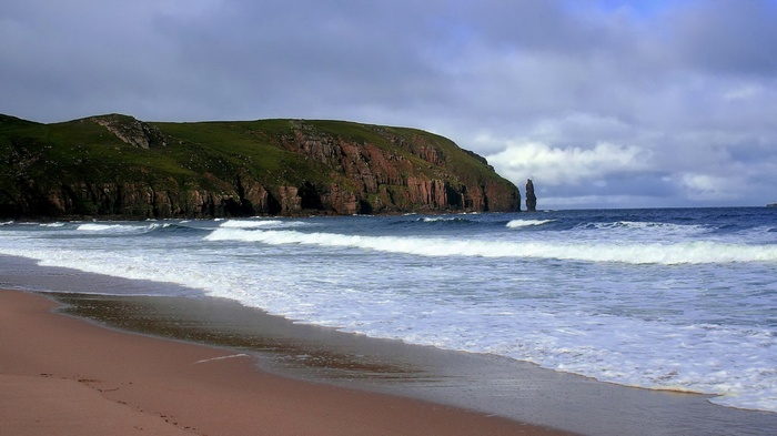 Beach with cliffs and sea stacks