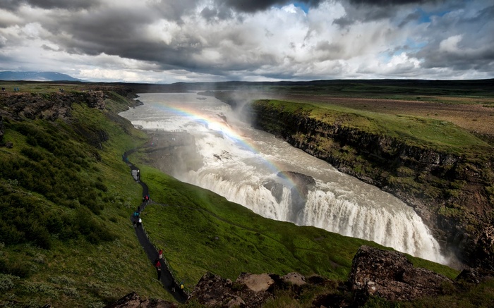 Gullfoss Waterfall with Rainbow and Tourists