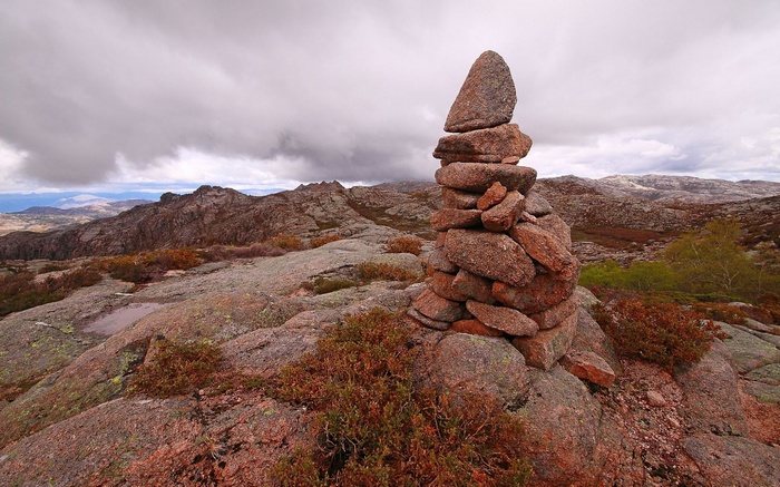 Stone cairn on a rocky mountain landscape