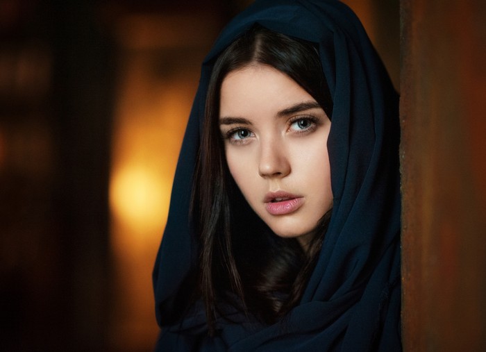 Portrait of a young woman with blue eyes