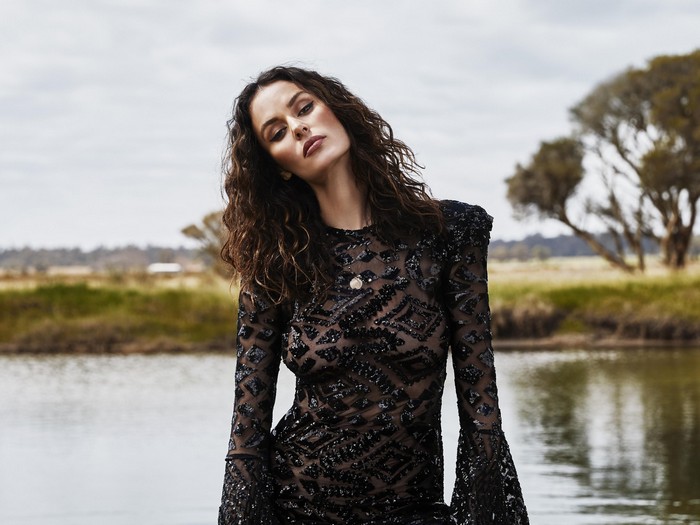 Nicole Trunfio in a black sequined dress