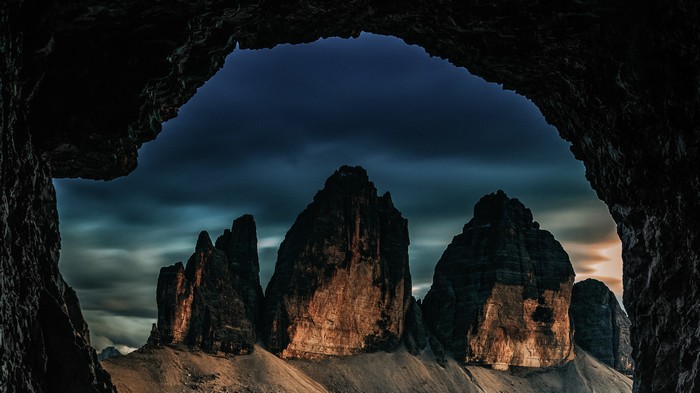 Majestic Cave View of Rocky Mountain Peaks in 4K