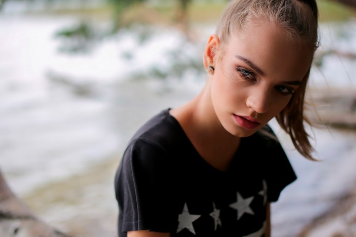 Young woman with blonde hair and blue eyes