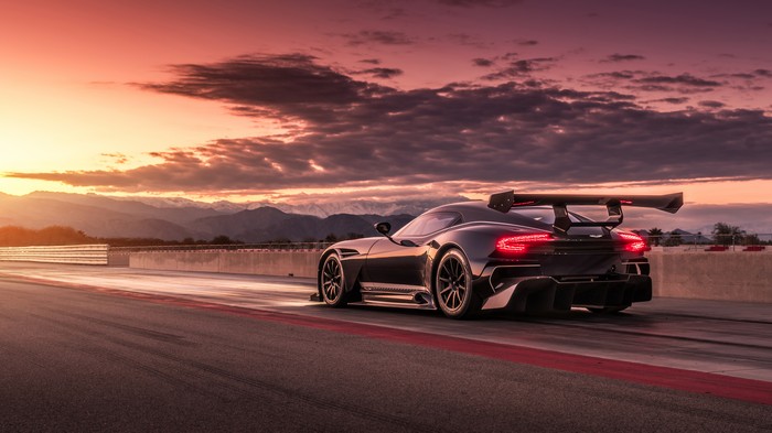Aston Martin Vulcan AMR Pro on a race track at sunset