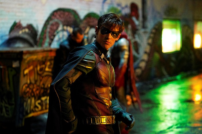 Robin from Titans in a Grungy Alley