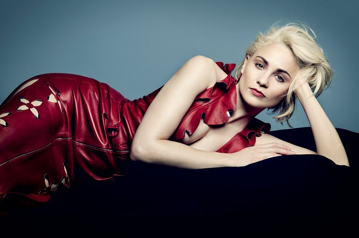 Tupperce Middleton in a red leather dress
