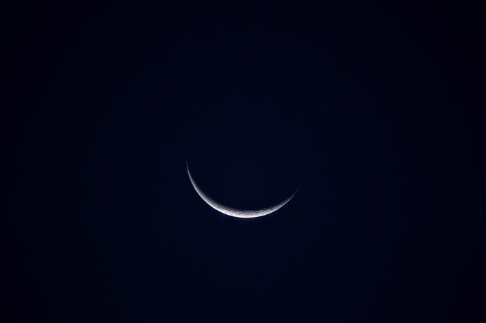 Crescent moon in the night sky