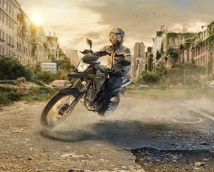 Honda motorcycle rider in a post-apocalyptic city