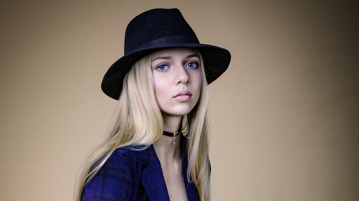 Nika Herndlhofer wearing a black hat and blue jacket