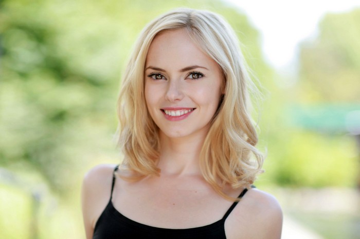 Hannah Tointon smiling outdoors