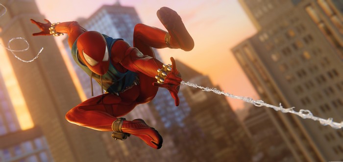 Scarlet Spider swinging through a city