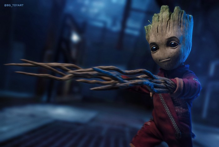 Baby Groot in a red jumpsuit