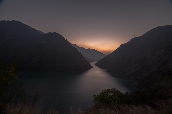 Lake and mountains at dusk