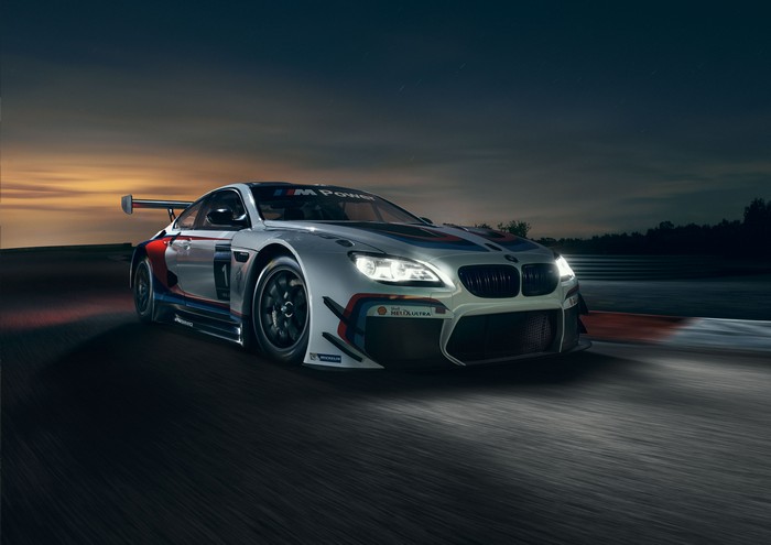 BMW M Power race car on track at night