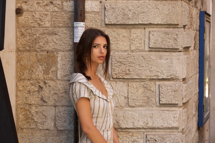 Emily Ratajkowski Poses Against a Stone Wall