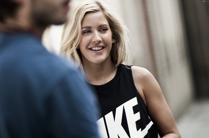 Ellie Goulding in a black Nike tank top