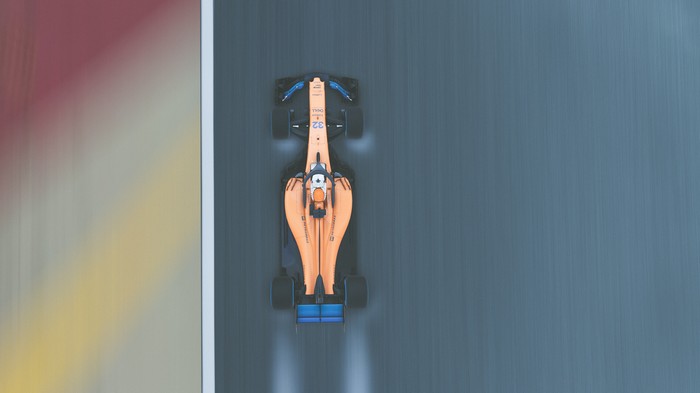 McLaren F1 car 32 racing on track 4K
