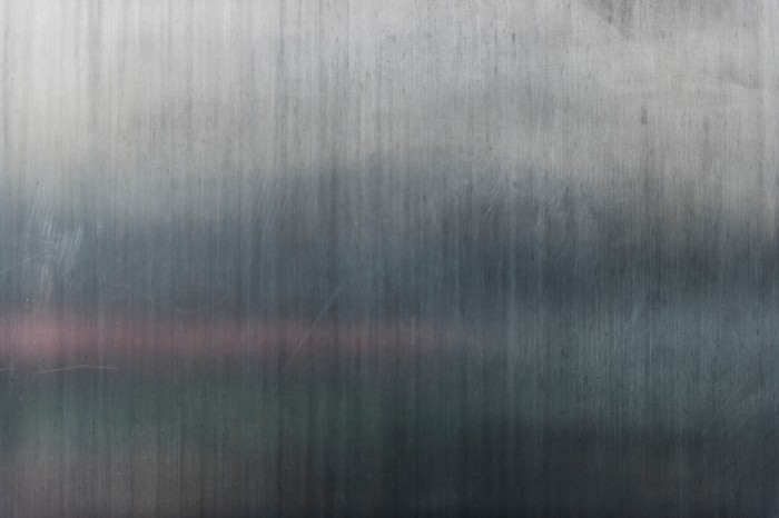 Brushed metal texture with vertical lines