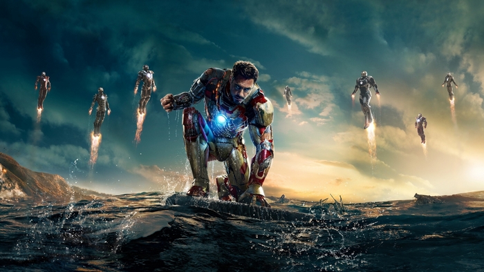 Iron Man with Multiple Suits Flying Over Water