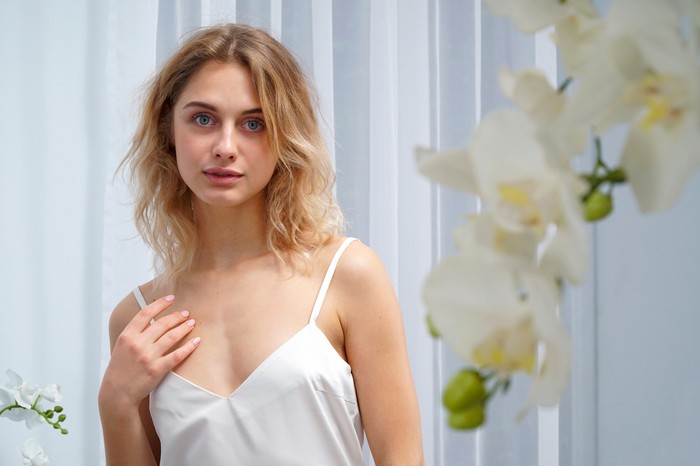 Blonde Woman in White Dress with Soft Natural Light 4K