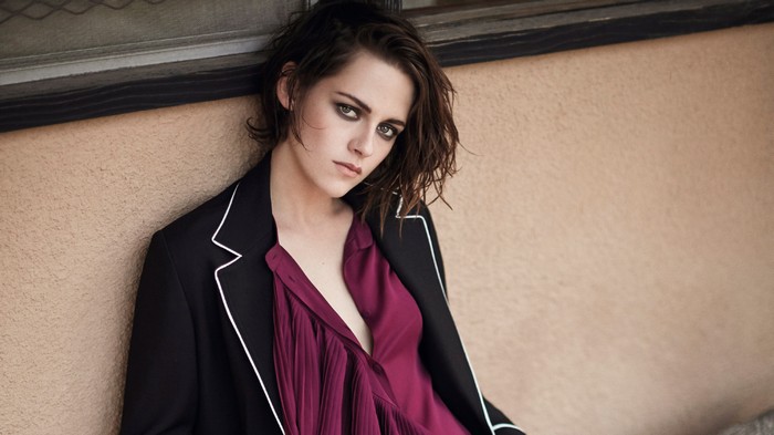 Kristen Stewart in a black blazer and purple top