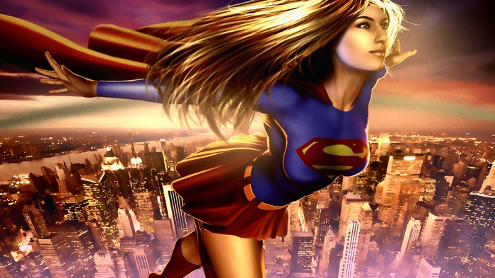 Supergirl flying over a city at sunset