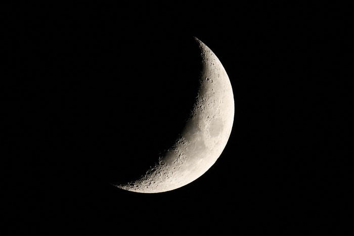 Crescent moon in the night sky