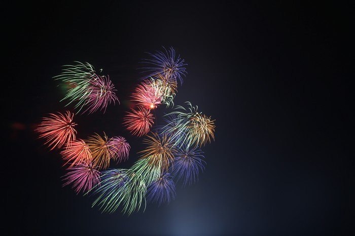 Colorful fireworks exploding in the night sky