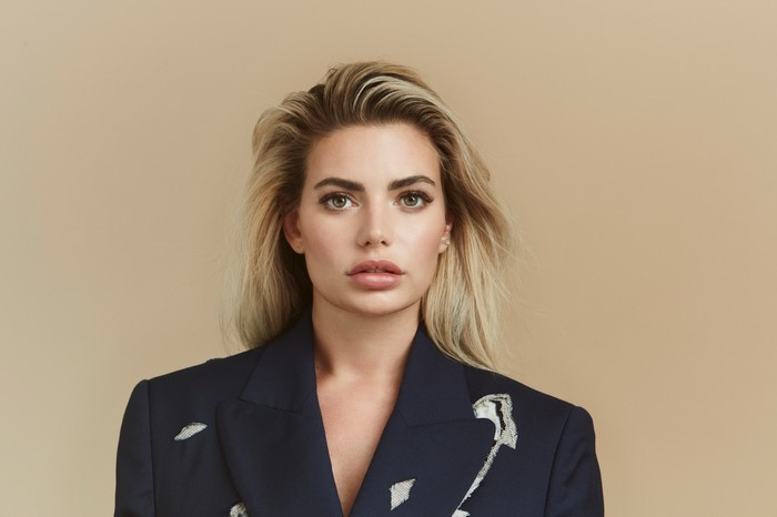 Megan Barton Hanson in a navy blazer