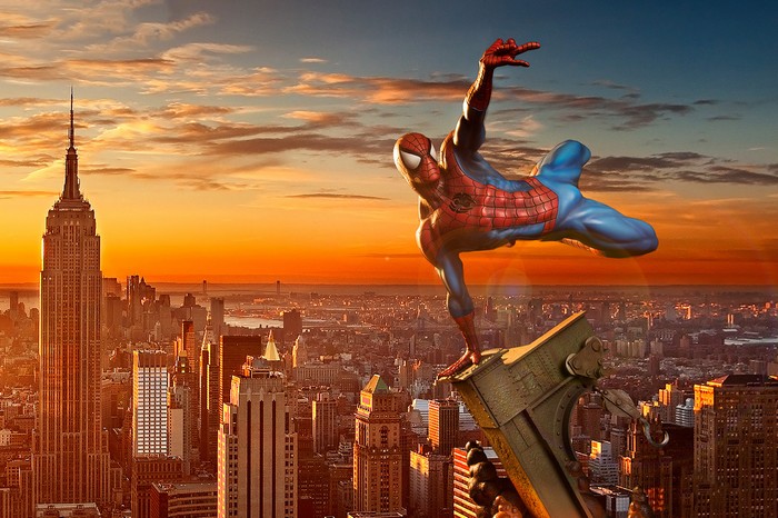 Spiderman on a building in New York City at sunset