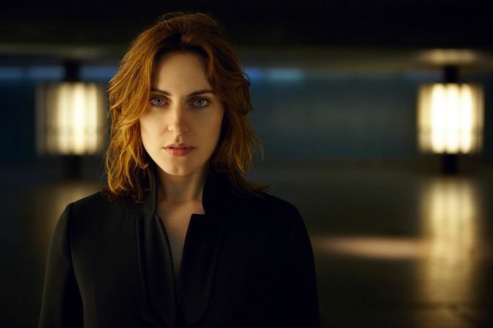 Antje Traue in a black outfit