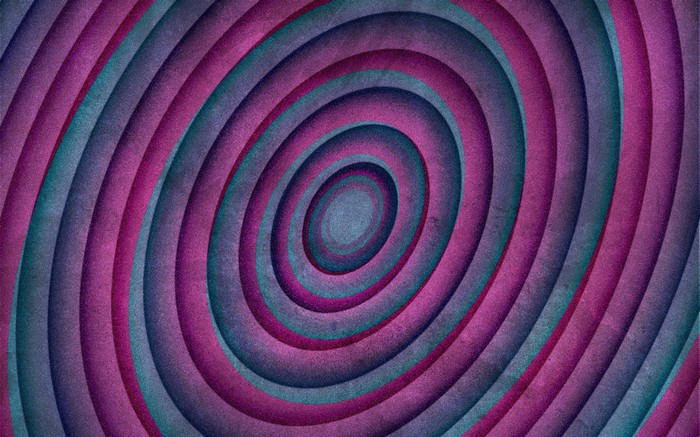 Abstract spiral pattern with purple and teal colors