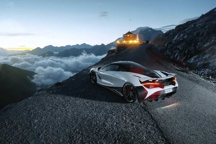 White McLaren 720S on a mountain road