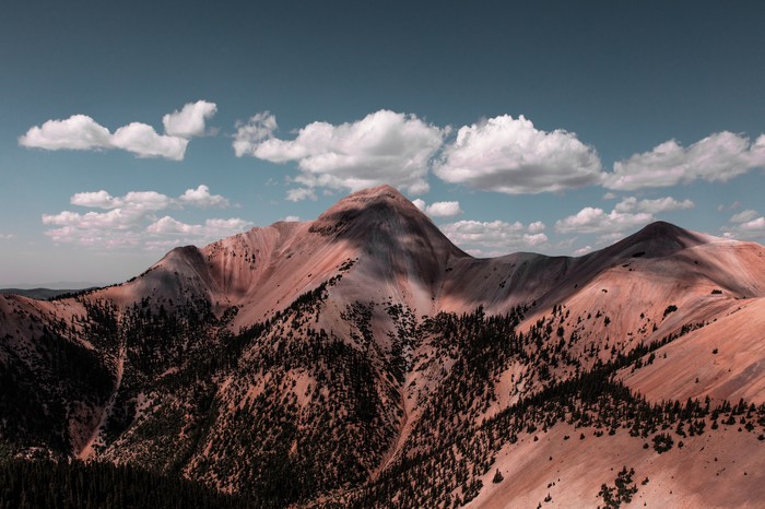 Mountains with clouds and trees