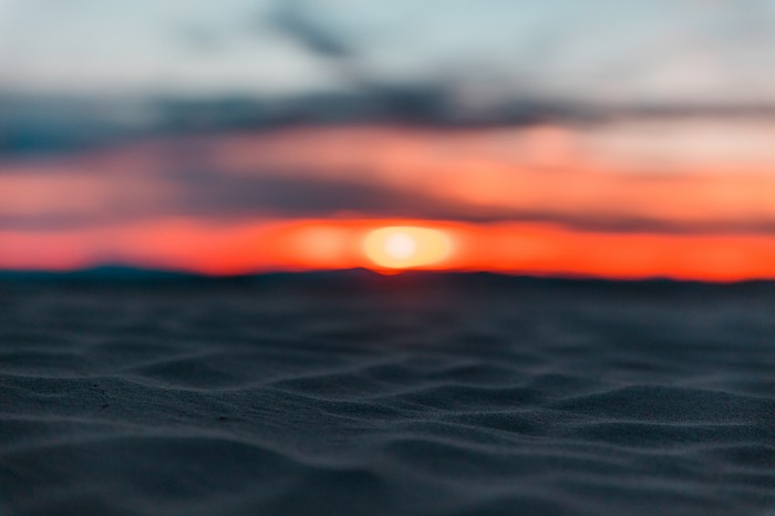 Sunset over sand dunes